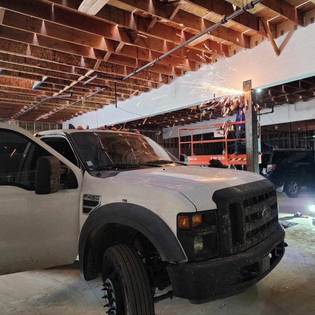 Mobile welding work on a truck in the shop