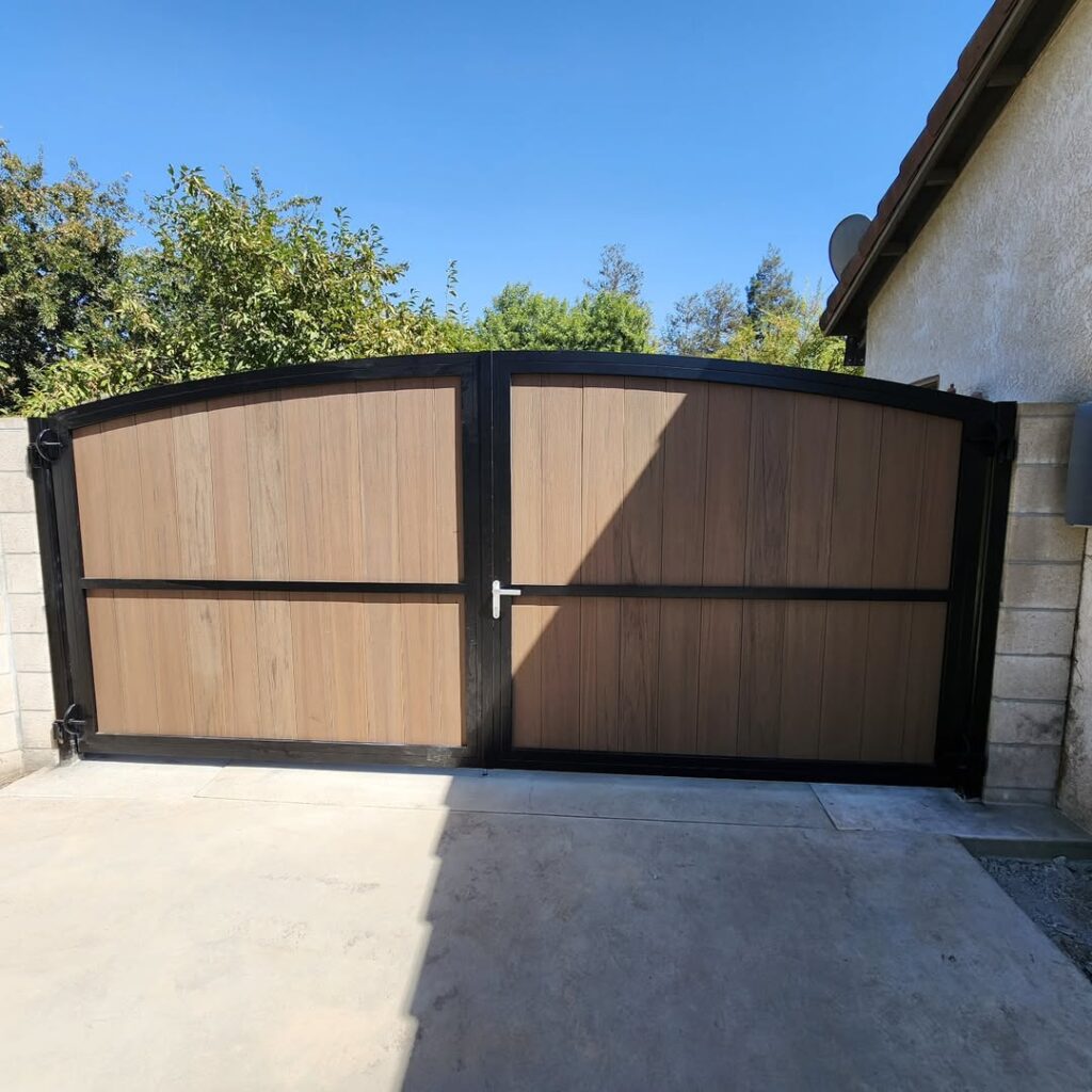 Modern steel driveway gate at a residence
