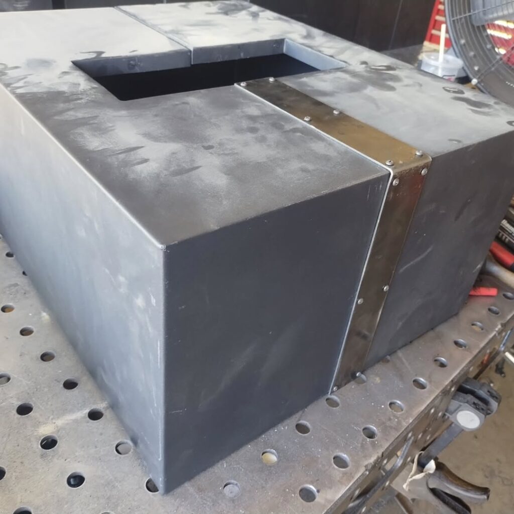 Fabricated steel enclosure on the welding table