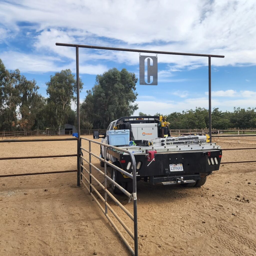 Truck fitted with a custom welding bed on a job site
