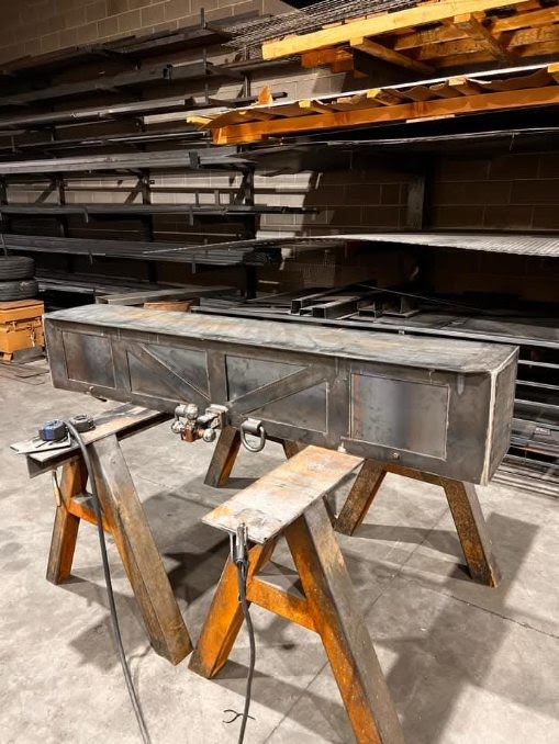 Stainless steel trough fabricated on sawhorses