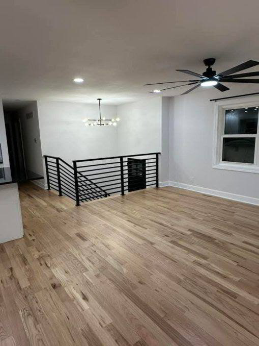Finished black metal stair railing in a completed home